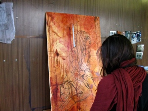 Casey Campbell working on her painting "Aia 10 Uheksa Viis"